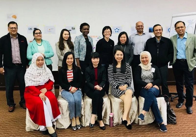 Group photo of senior leaders after a facilitation